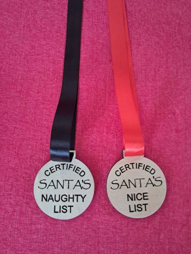 Naughty and nice wooden medals