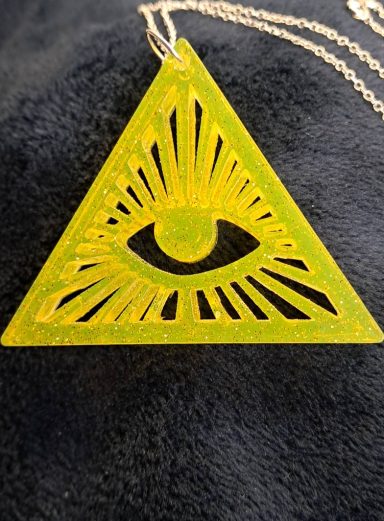 All Seeing Eye in bright yellow resin with glitter, handmade